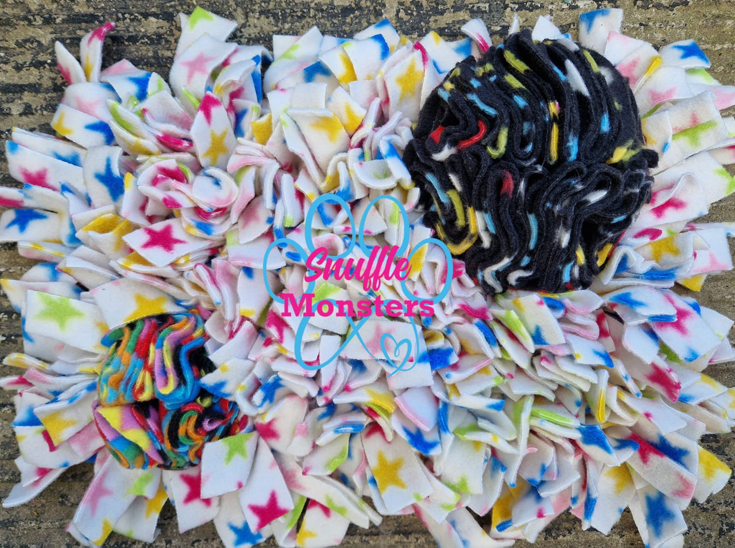 Snuffle Monsters Multi Mat with snuffle monsters logo